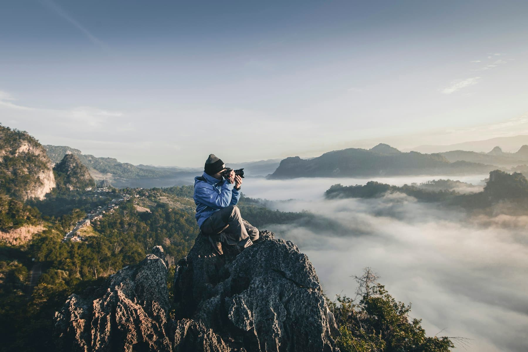 Photographer working with professional camera equipment